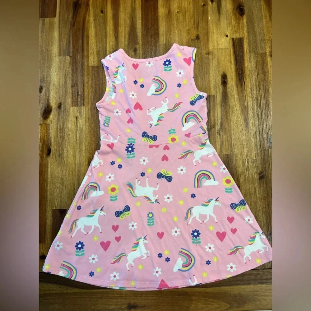 Girls pink unicorn and rainbows dress size M(7-8)